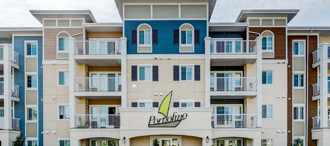 Exterior of a four-storey apartment property.